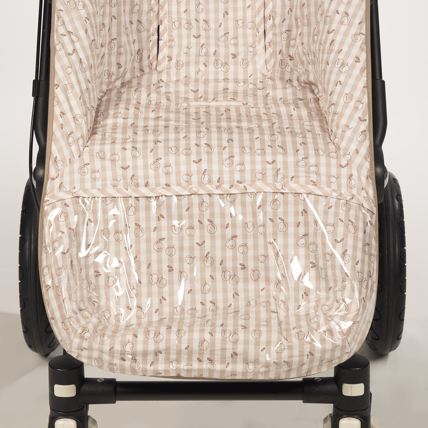 Saco silla Peach entretiempo Pasito a Pasito Funda Peach en tela de cuadros y un suave y fresco tejido tipo saco, ideal para cubrir la silla de paseo provista de saco